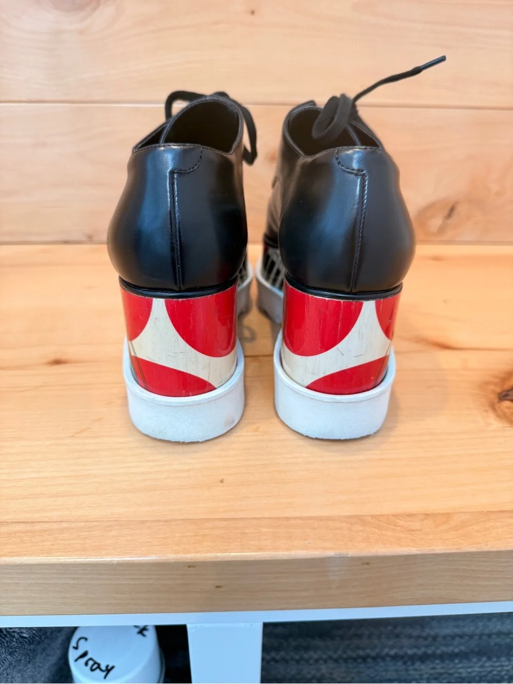 Stella McCartney Black Leather Elyse Platform Shoes with abstract design.